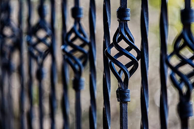 Close up of black metal gate