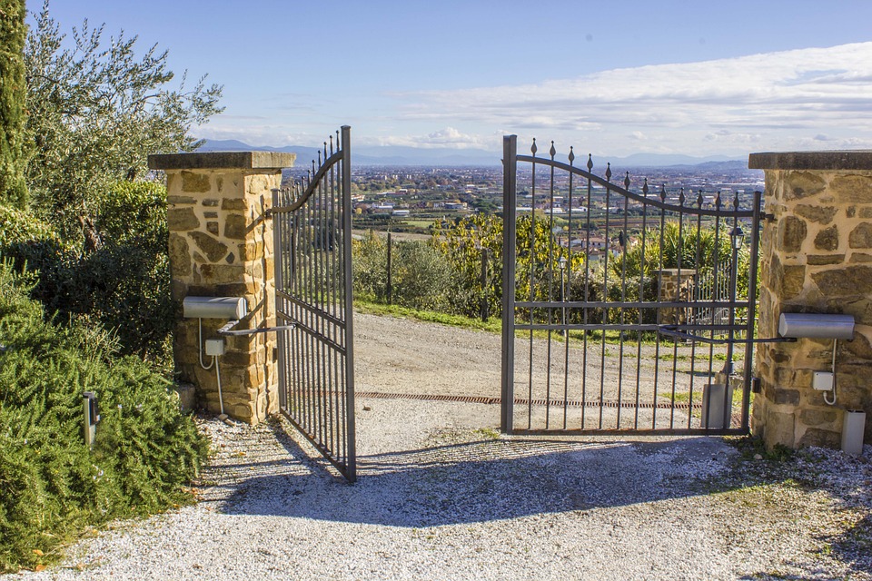 Open steel gates with scenic view